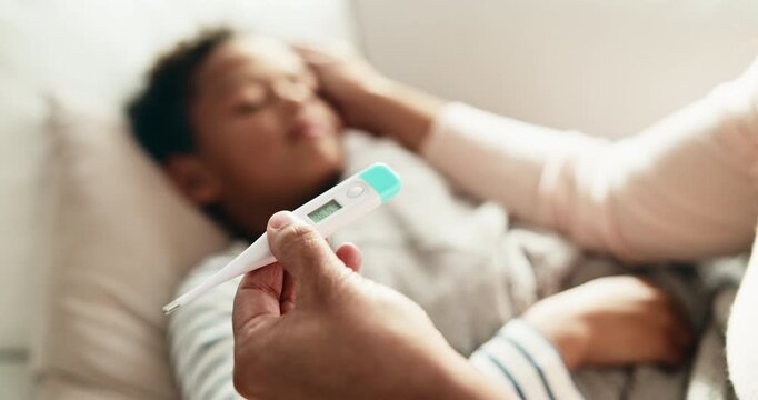 Hands, mother and child in home with thermometer, childcare and health monitor with flu symptoms. Sick, mom or kid in living room with tech, parent comfort or temperature check in illness assessment