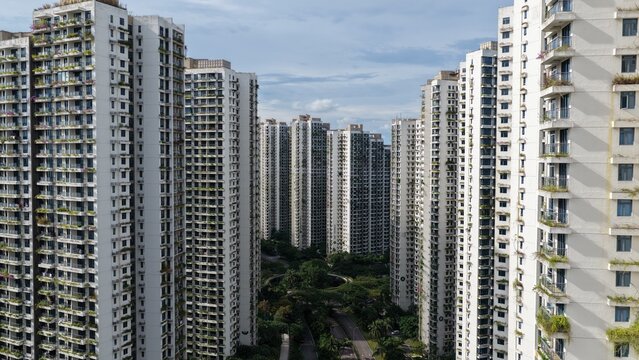 Aerial view of Forest City residential towers with lush green balconies and modern architecture in Gelang Patah, Johor Darul Ta'zim, Malaysia.