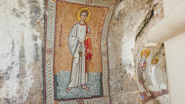Religious rock mural art at Ostrog Monastery in Montenegro