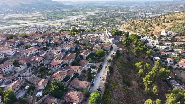 Aerial drone view over historic Berat old town with traditional houses and scenic valley in Albania