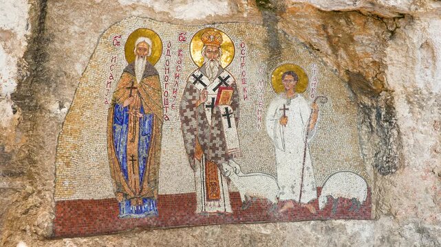 Religious rock mural art at Ostrog Monastery in Montenegro