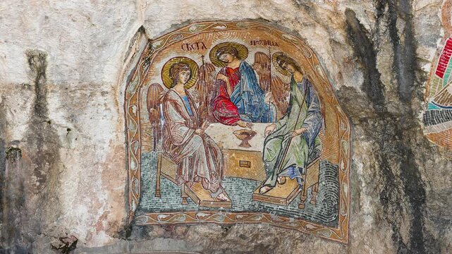 Religious rock mural art at Ostrog Monastery in Montenegro