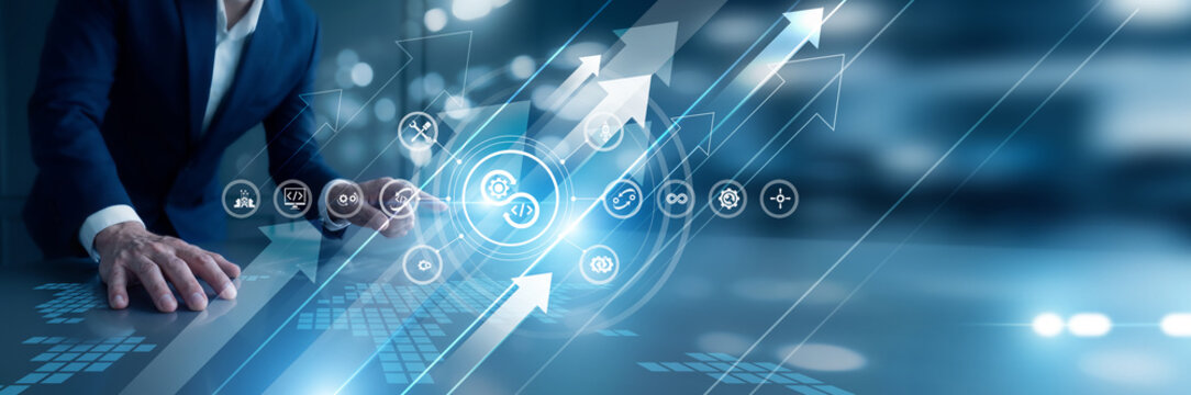 Software lead DevOps hand touch automation pipeline bridging development and IT operations. Continuous integration workflows accelerate software delivery through collaborative practices.