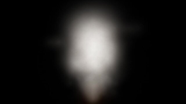 Glowing white smoke plume and soft vapor cloud rising animation on a dark background - 4K video