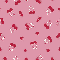 Sweet cherries with bows and hearts scattered on a soft pink background seamless pattern © SA Graphic Desing