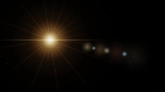 Glowing golden sunflare and bright optical lens flare movement on a dark space background - 4K video