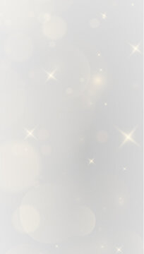 Vertical overlay of golden sparkles and glowing stars on a transparent background. Magical light flare and soft bokeh effect for festive holiday designs