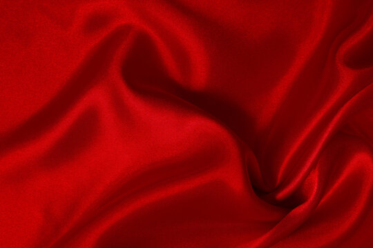 Dark red fabric texture background, detail of silk or linen pattern.