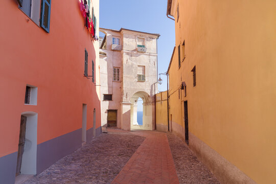 Pedestrian street in the old town of Imperia, seaside city on the Italian Riviera