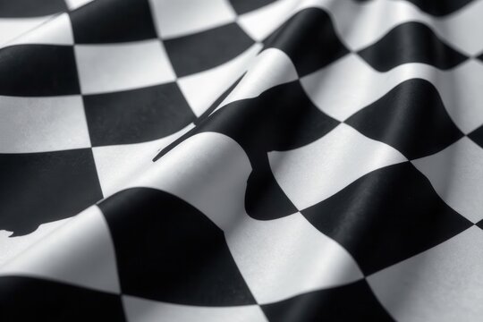 Close-up of black and white checkered racing flag detail, abstract pattern, texture, seamless pattern