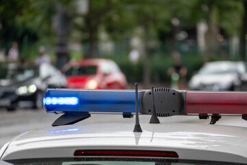 Police Car Emergency Siren Lights on Urban Street © Daniel