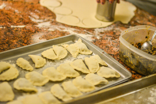 Copy space pierogi Polish dumplings making of raw preparing meal tradition Holidays season , food home made backgrounds
