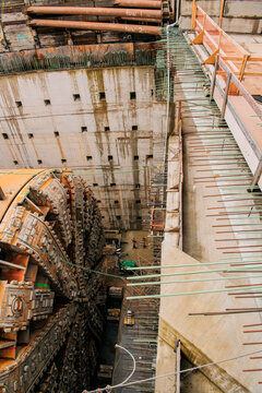 A tunnel boring machine is drilling a tunnel in a construction site