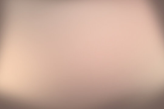 Soft pastel gradient background in shades of peach and beige for digital design
