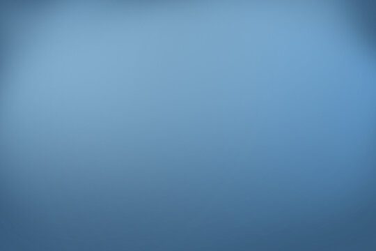 Abstract blurred blue gradient background with soft rectangular shapes and subtle texture