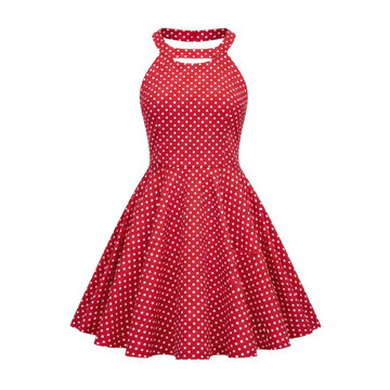 Red polka dot summer dress with halter neck design isolated on white background