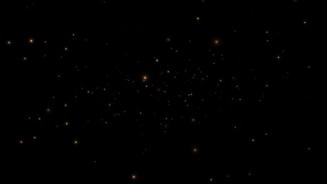 Smoothly flying glowing particles on a black background. Golden particles, shimmering light particles, magical golden dust. 4K video.