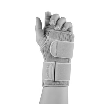 Medical wrist support brace on a hand isolated on white background