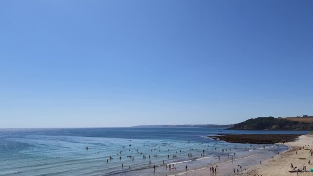 Falmouth Cornwall England UK. 13.08.2026. Video. View over Castle Beach Falmouth  with holidaymakers enjoying the sunny day.