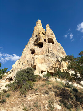 Ancient cave dwellings carved into volcanic rock at Yaprakhisar, Aksaray, Turkey.