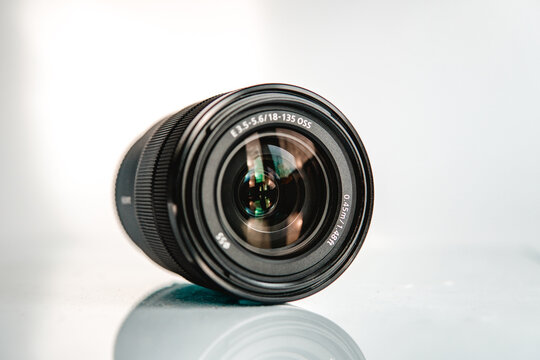 Professional digital camera lens on reflective background