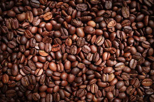 Coffee beans background, top view texture