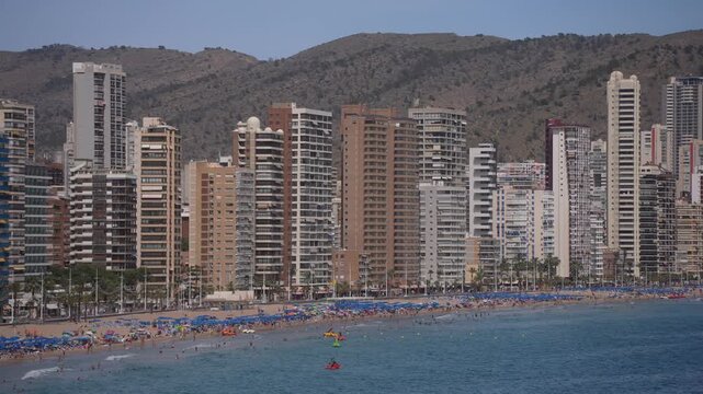 View of sea and hotels and high rise buildings lining coastline of Playa Levante sandy beach, Benidorm, Alicante Province, Costa Blanca, Spain