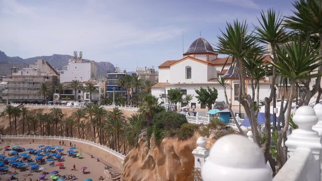 View of Esgl&Atilde;&copy;sia de Sant Jaume i Santa Anna church and Cala del Mal Pas sandy beach, Benidorm, Alicante Province, Costa Blanca, Spain