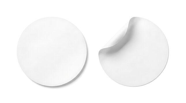 Two blank white circular adhesive stickers peeled back on a clean white background