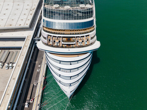 Luxury liner resort. Cruise ship voyage. Traveling by sea. Aerial top view of cruise in summer vacation. Cruise ship tour and travel at sea. Aerial view of luxury liner voyage. Ship top view