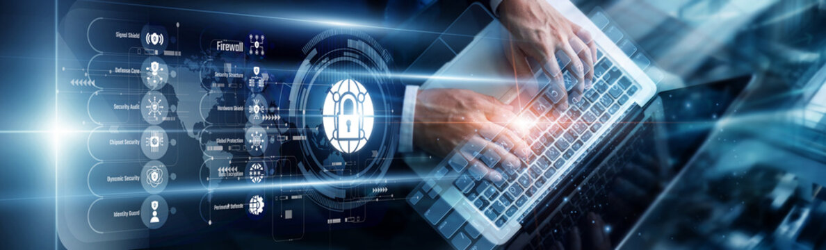 A specialist using a laptop to analyze network security logs for vulnerabilities. This development hardens digital perimeters, protecting corporate infrastructure from sophisticated threats.