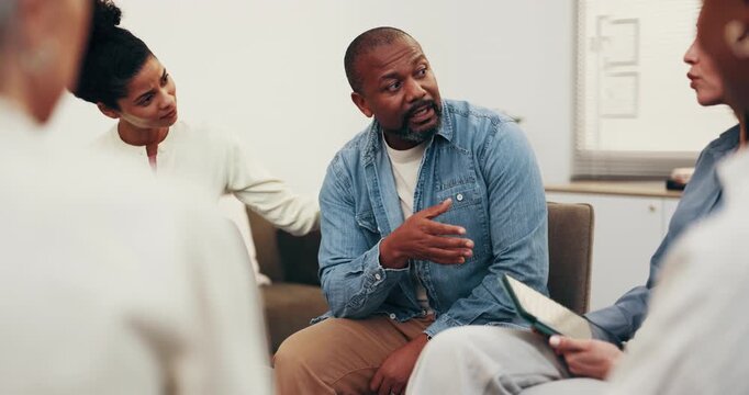 Counseling, group and people in center with support, understanding and empathy in clinic. Mental health, psychologist and patients with shoulder touch, encouragement and coping together in therapy.
