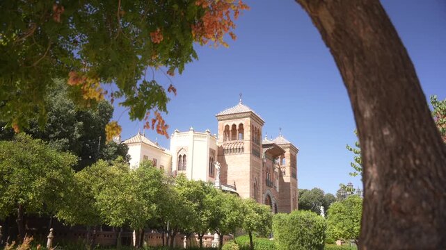 View of Museum of Popular Arts and Customs of Seville in Parque de Mari&shy;a Luisa on a sunny day, Seville, Andalusia, Spain