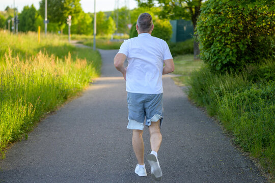 Senior Runner Back View Outdoors