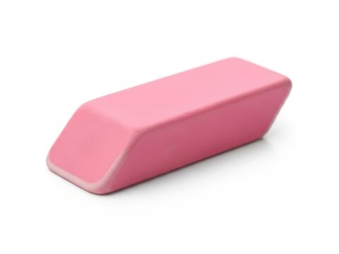 Pink rubber eraser for pencil marks on paper