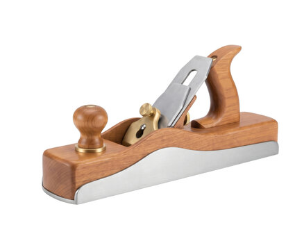 Classic wooden hand plane with metal blade and brass fittings on transparent background