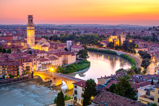 Verona, Italy at sunset with historic bridge over the Adige River
