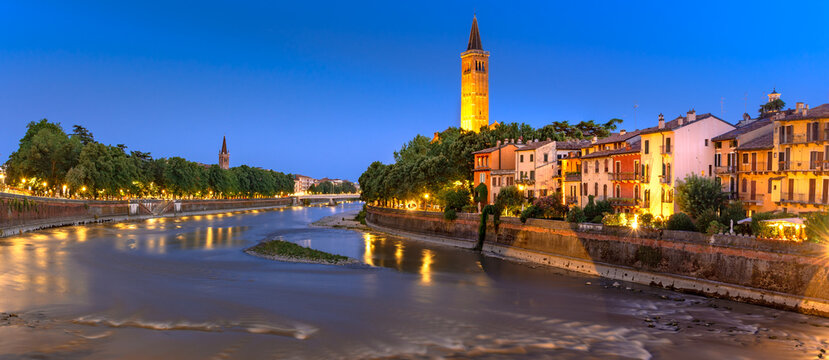 Verona, Italy at sunset with historic bridge over the Adige River