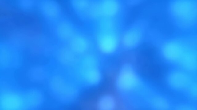 Soft blue and cyan light forms drift through a fully defocused abstract field. Website hero, title sequence, and social media design.