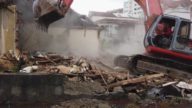 Buldozer demolishes buildings in urban area in Skopje, North Macedonia