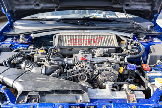 Close-up of Subaru car engine compartment with STI branding under open hood. Kaliningrad, Russia &mdash; August 23, 2026