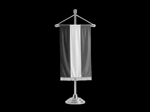 Silver desk flag stand with a vertical black, white, and gray striped banner isolated on black background
