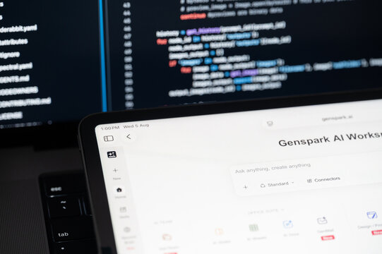 Genspark Ai company web page on program code background