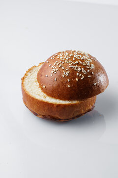 Open Sesame Seed Burger Bun with Golden Crust and Soft White Interior