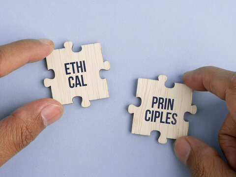 Wooden puzzle with the word ethical principles. ethical concept. autonomy, beneficence, justice, and non-maleficence