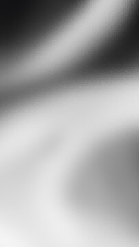 Abstract monochrome black and white blurred aura background with frosted glass texture vertical composition perfect for mobile device technology luxury wallpapers.