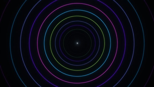 Vibrant concentric neon circles glowing in the dark against a black background create an abstract digital tunnel effect.