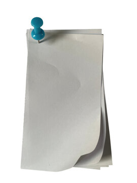 A stack of light grey paper sheets held together by a single small blue push pin for notes and reminders