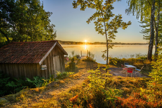 Hallangen lake pier at sunrise. Kalmar region. Sweden