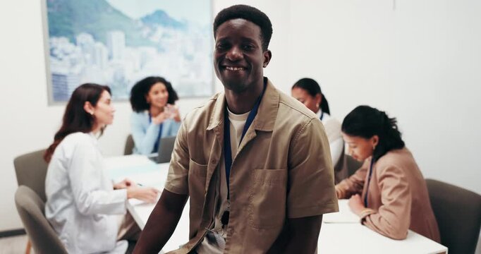 Happy, face and man in meeting with doctors, healthcare workers and admin for financial planning. Portrait, hospital and person with pride for medical insurance, budget and finance advisor for clinic
